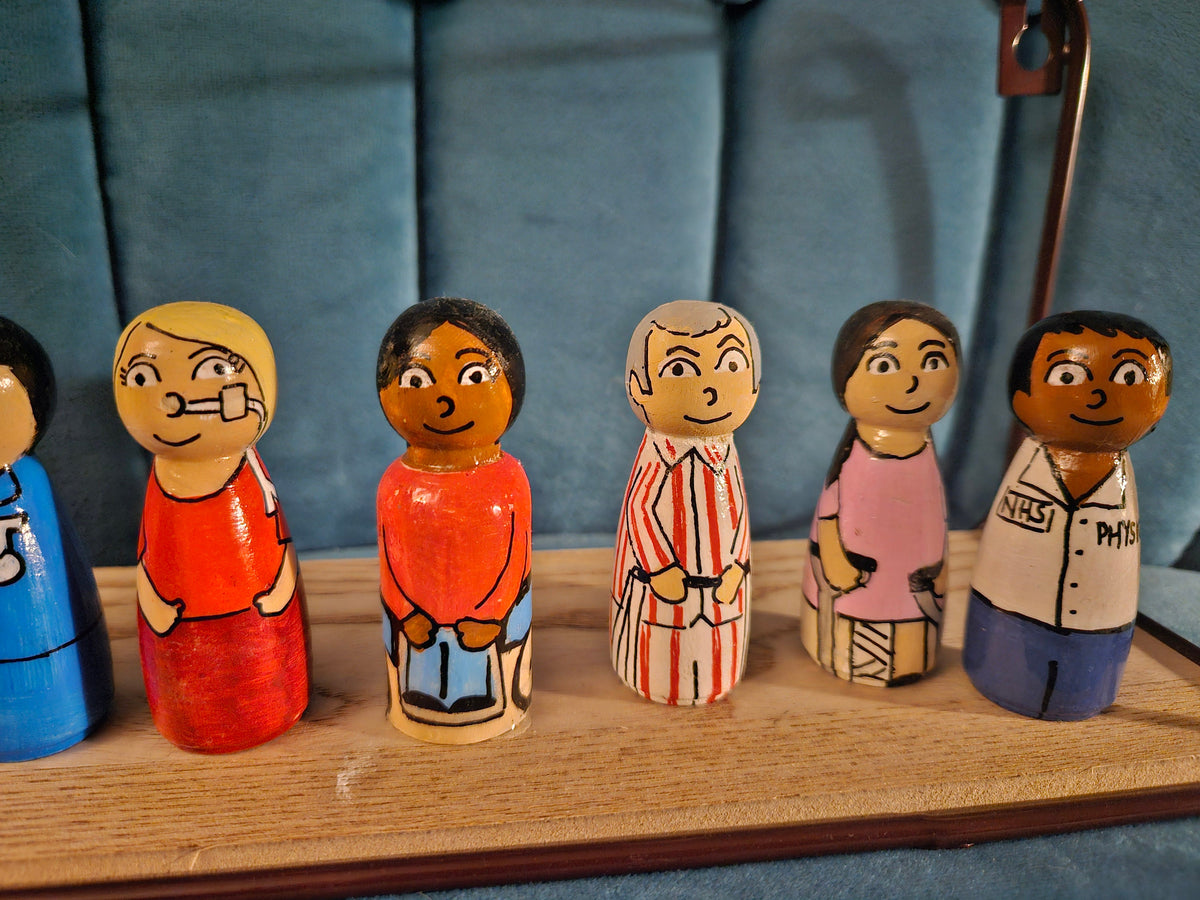 Hospital set of peg dolls featuring drs,nurse and patients