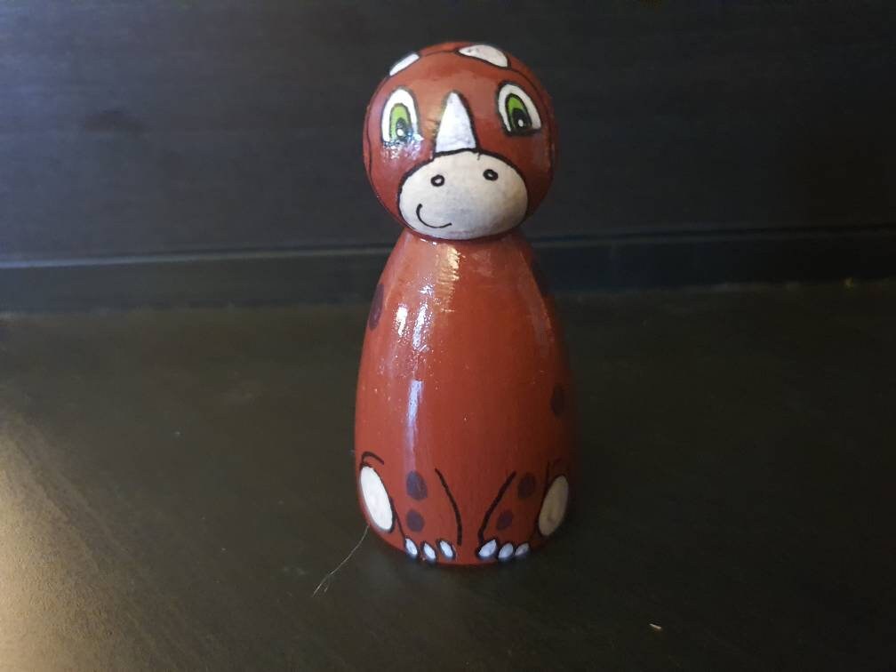 Brown dinosaur peg doll