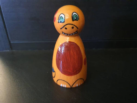 Orange dinosaur pegdoll
