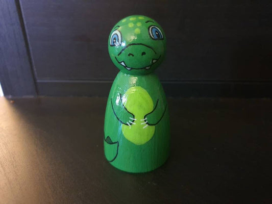 Green dinosaur peg doll